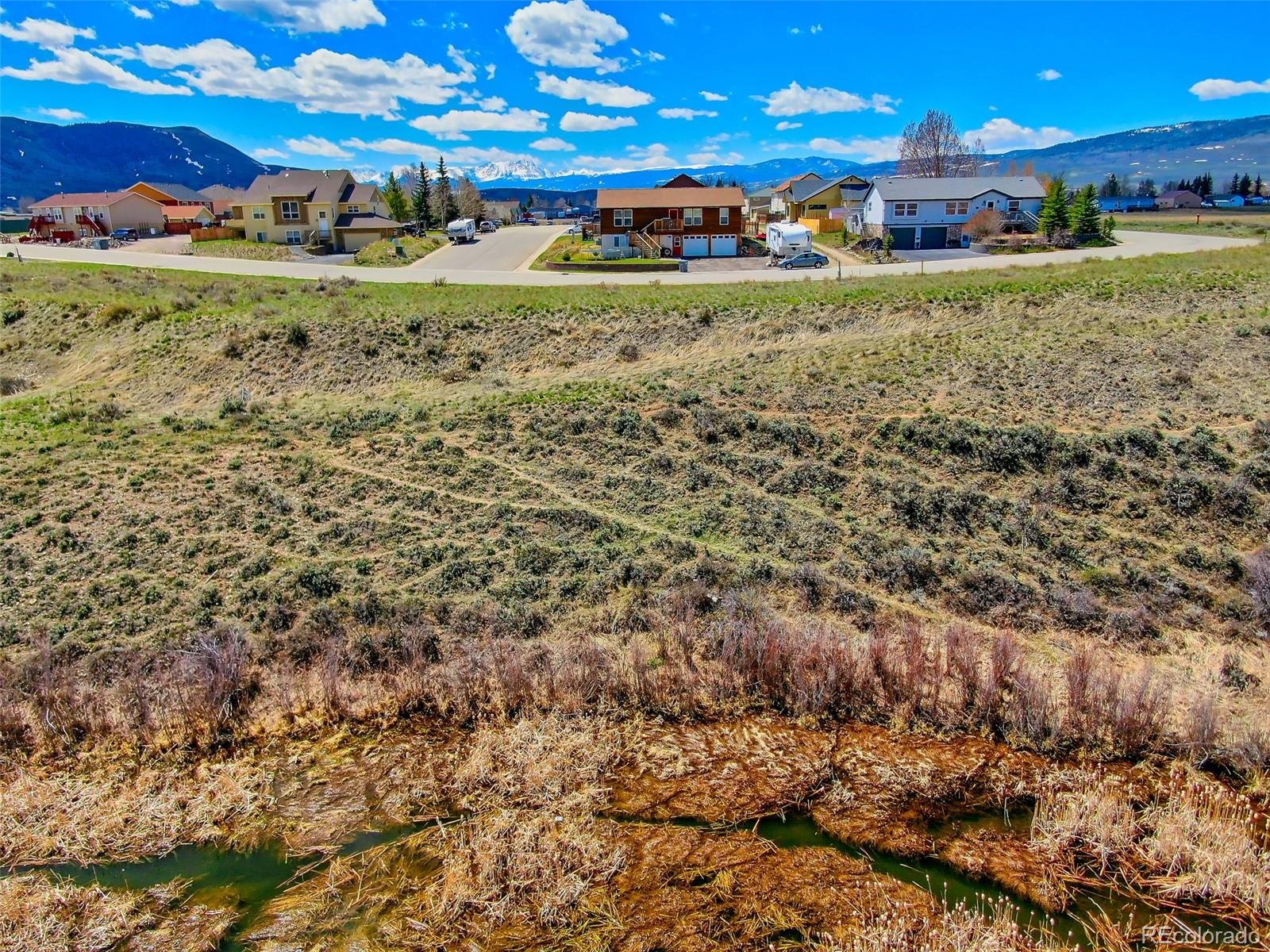 1111 Bluff Avenue Kremmling, CO 80459 - Photo 4 of 10 a view of a golf course with a building