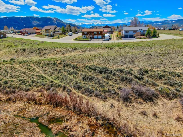a view of a water with mountain view