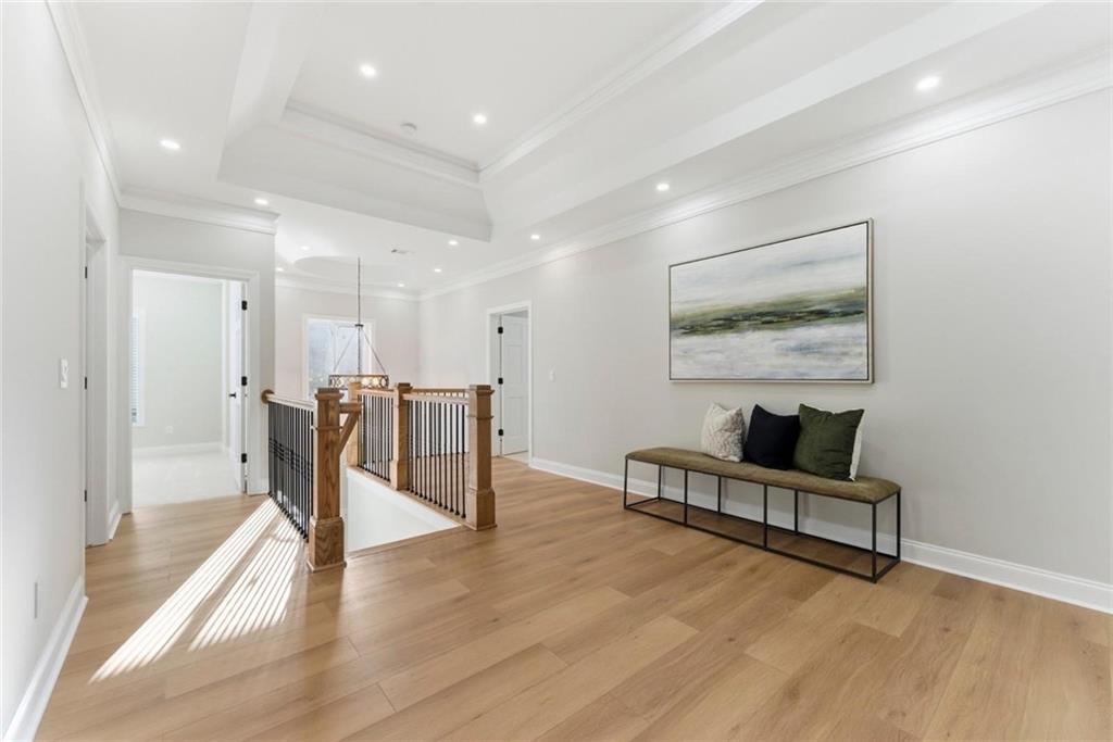 2990 Shallowford Road Atlanta, GA 30341 - Photo 18 of 34 a view of a hallway with wooden floor and furniture