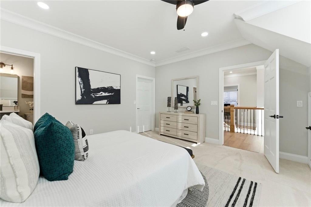 2990 Shallowford Road Atlanta, GA 30341 - Photo 26 of 34 a spacious bedroom with a bed and dresser