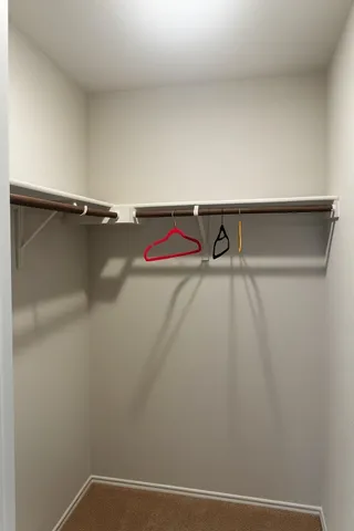 a view of a room with racks on the wall