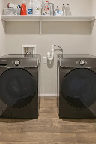 a utility room with a washer and dryer