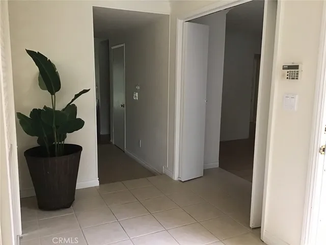 a kitchen with granite countertop cabinets a sink and a stove