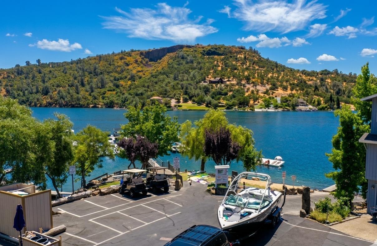 411 Sunrise Road Copperopolis, CA 95228 - Photo 64 of 76 Upper view of the Lake Tulloch Shores boat launch, swim area and golf-cart parking.