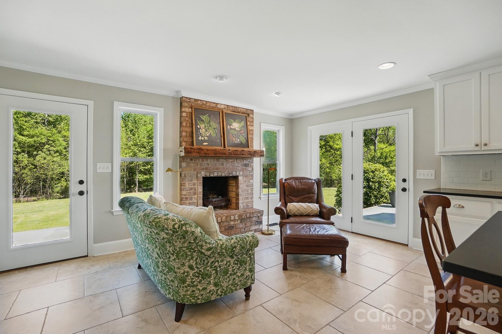 411 Baucom Deese Road Monroe, NC 28110 - Photo 15 of 45 a living room with furniture and a fireplace