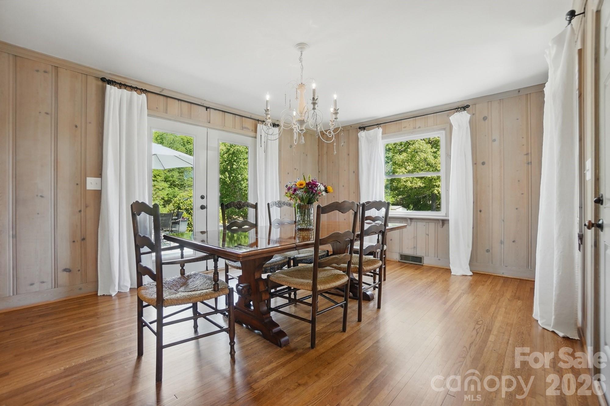 411 Baucom Deese Road Monroe, NC 28110 - Photo 18 of 45 a view of a dining room with furniture window and wooden floor