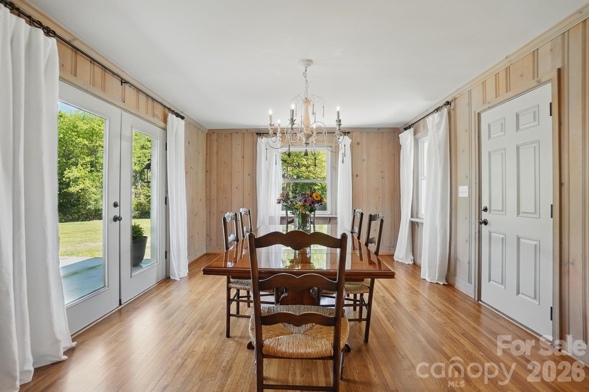 411 Baucom Deese Road Monroe, NC 28110 - Photo 19 of 45 a view of a dining room with furniture window and wooden floor
