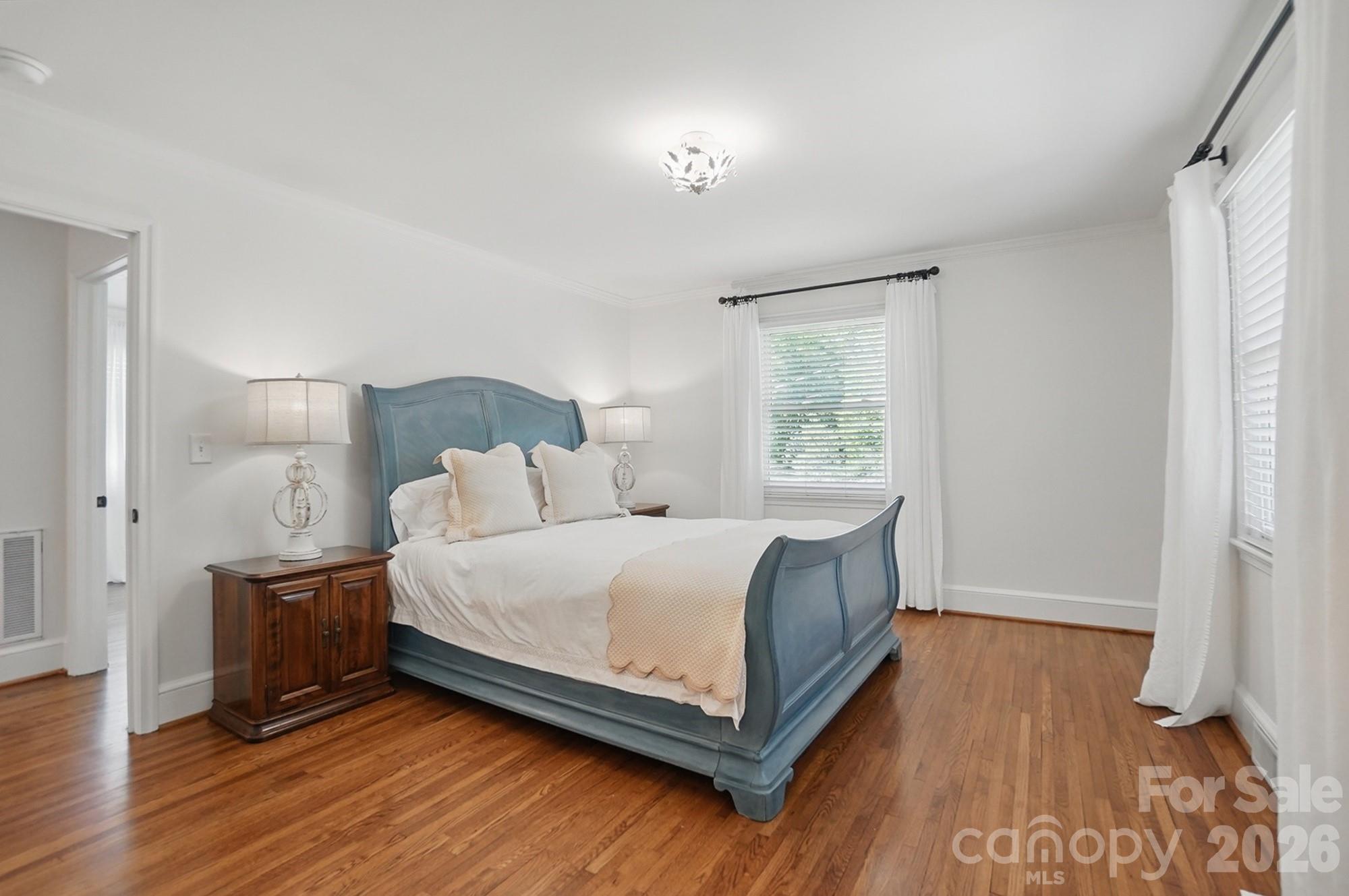 411 Baucom Deese Road Monroe, NC 28110 - Photo 21 of 45 a bedroom with a bed and window