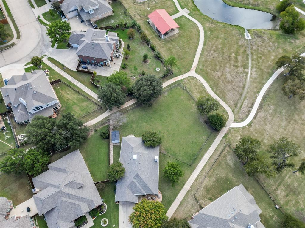 6403 Highland Crest Lane Sachse, TX 75048 - Photo 29 of 40 View of property location with nearby suburban area and a nearby body of water