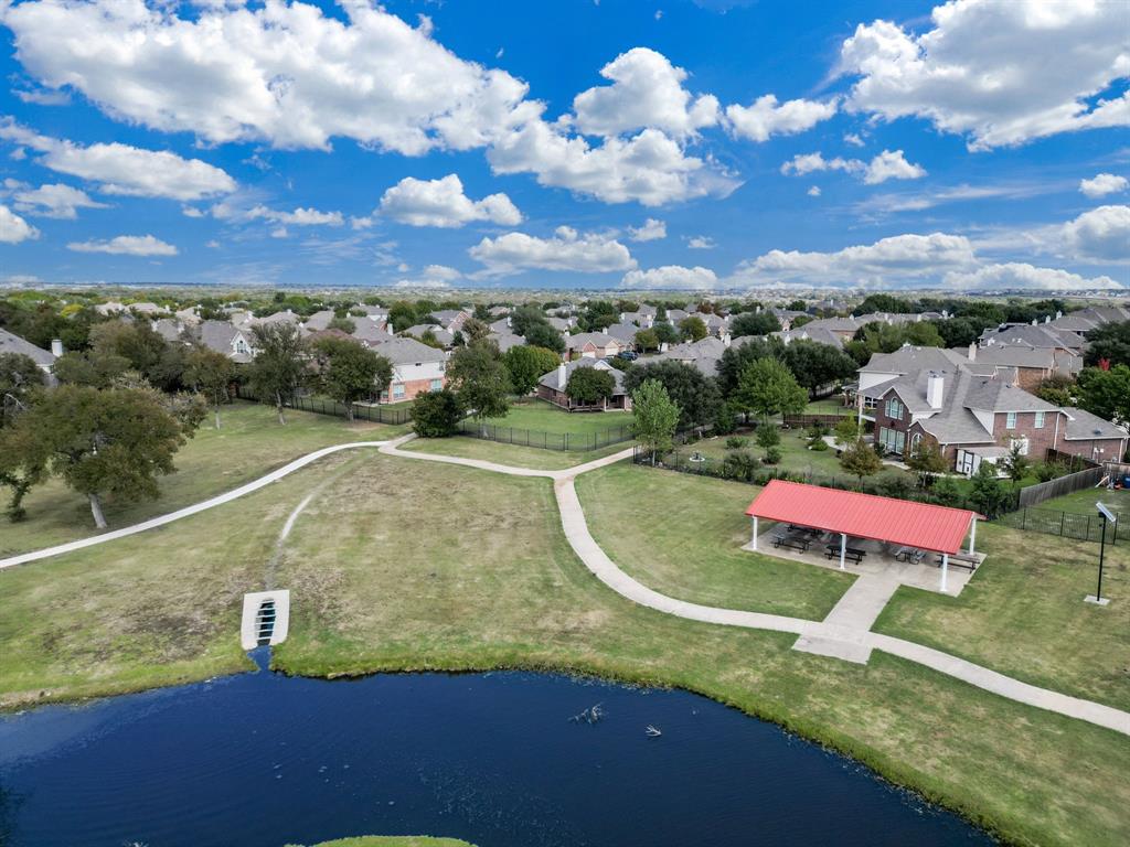 6403 Highland Crest Lane Sachse, TX 75048 - Photo 34 of 40 Aerial view of residential area with a nearby body of water