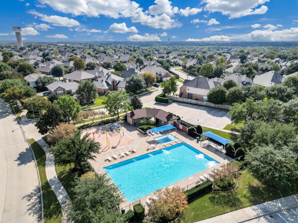 6403 Highland Crest Lane Sachse, TX 75048 - Photo 37 of 40 Aerial view of residential area with a pool