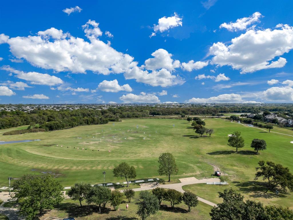 6403 Highland Crest Lane Sachse, TX 75048 - Photo 38 of 40 Drone / aerial view of a tree filled landscape
