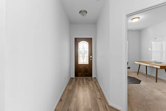 a room with furniture and a window