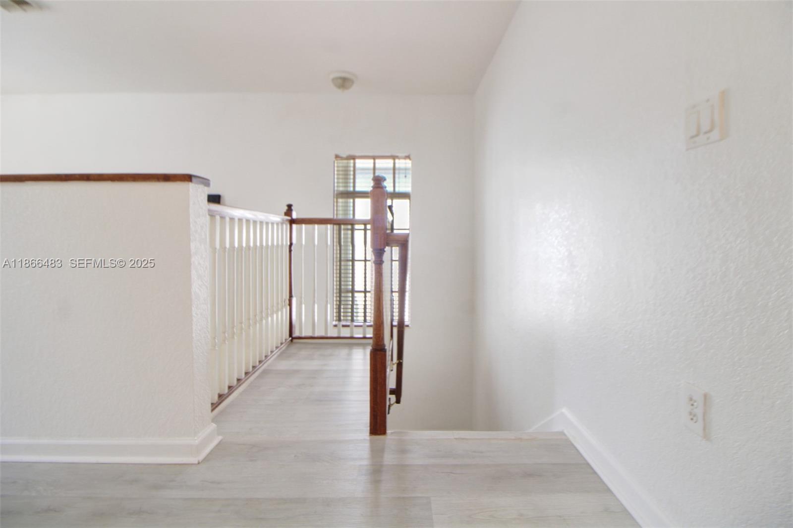 14077 Southwest 274th Terrace Homestead, FL 33032 - Photo 17 of 29 a view of a hallway