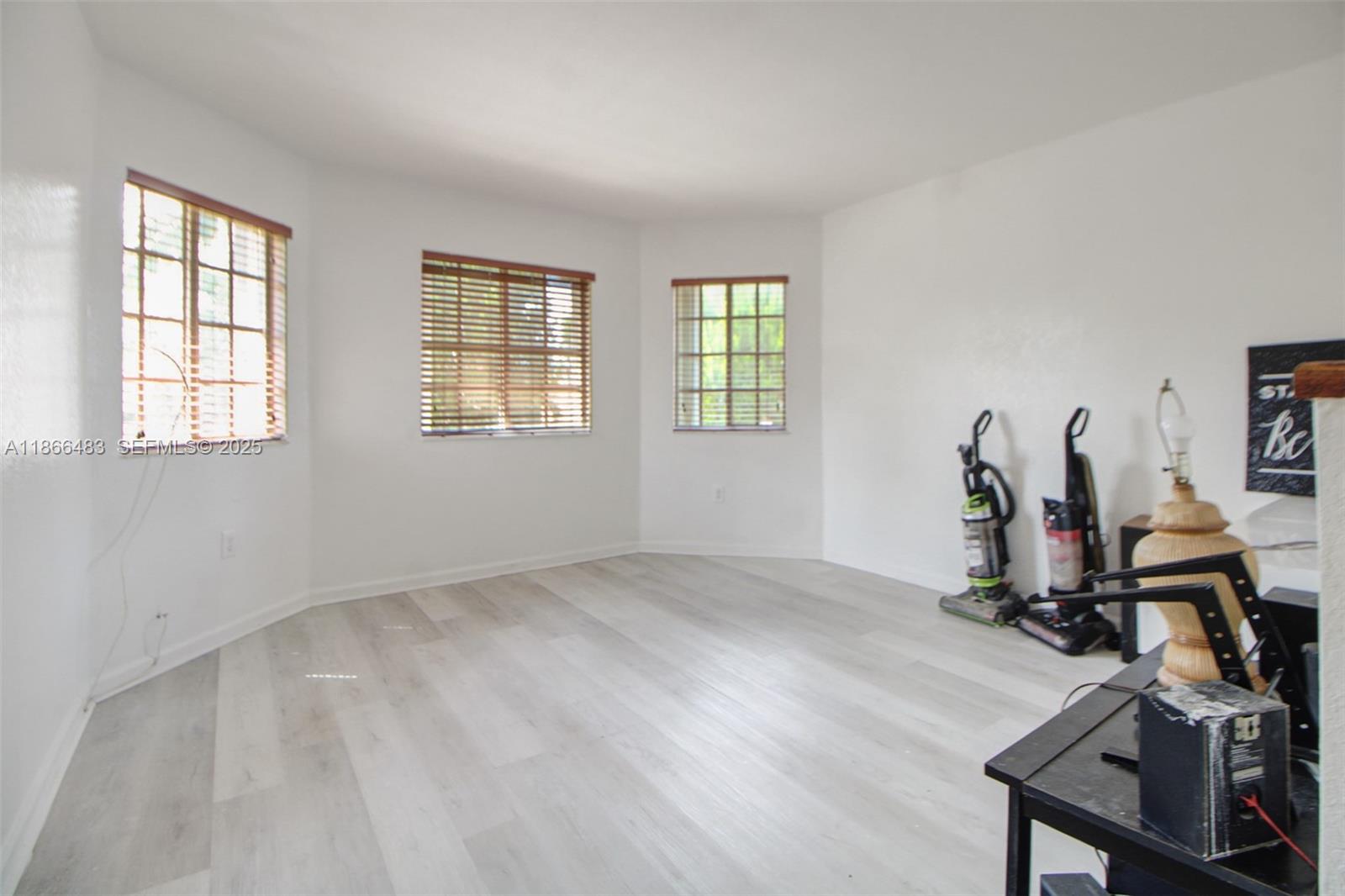 14077 Southwest 274th Terrace Homestead, FL 33032 - Photo 20 of 29 a view of a room with gym equipment