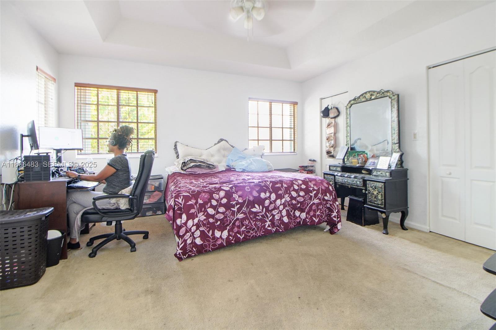 14077 Southwest 274th Terrace Homestead, FL 33032 - Photo 10 of 29 a bedroom with a bed furniture and a window