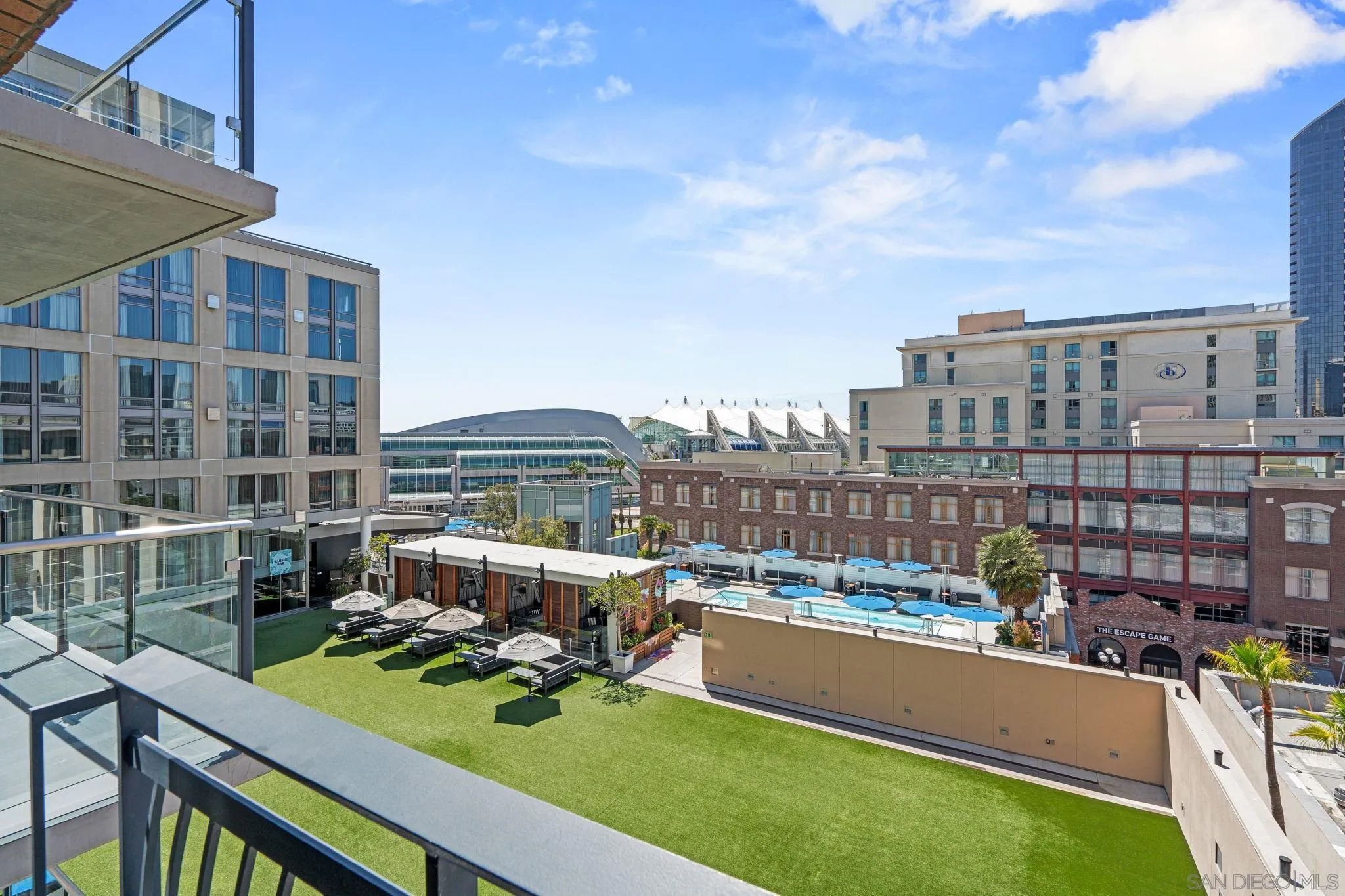 207 Fifth Avenue, Unit 739 San Diego, CA 92101 - Photo 1 of 30 a view of swimming pool with outdoor seating and city view