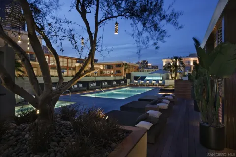 a view of swimming pool with outdoor seating