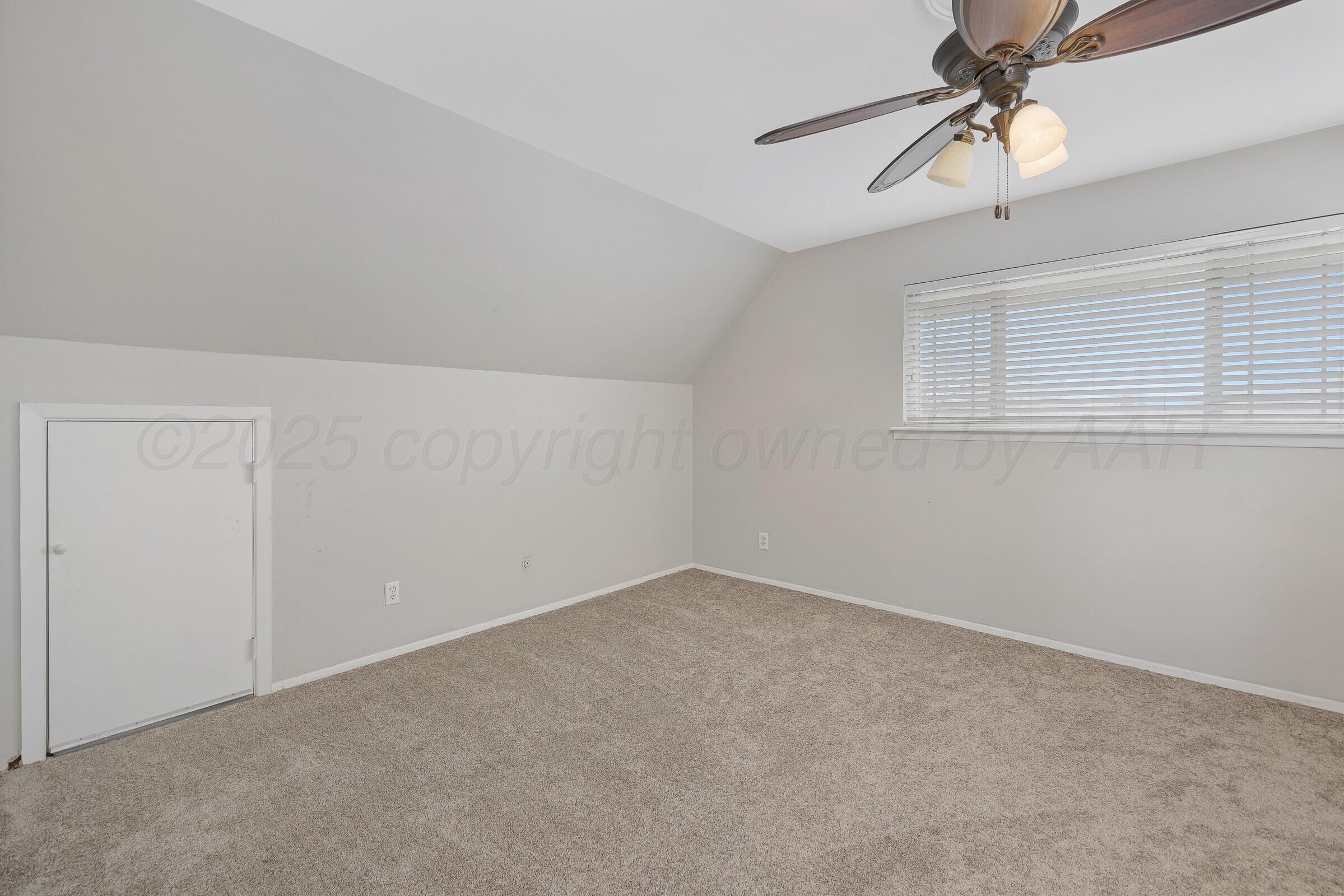 5211 Southwest 36th Avenue Amarillo, TX 79109 - Photo 17 of 22 a view of an empty room with a window