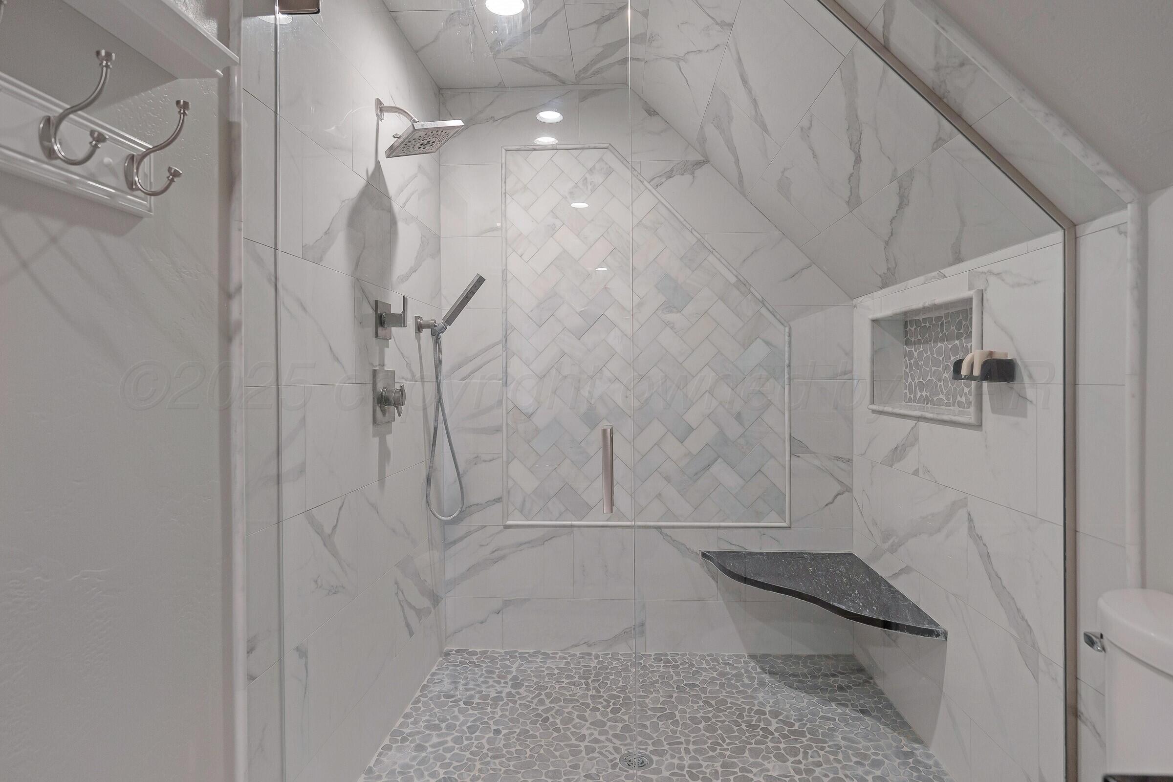 5211 Southwest 36th Avenue Amarillo, TX 79109 - Photo 19 of 22 a bathroom with a shower