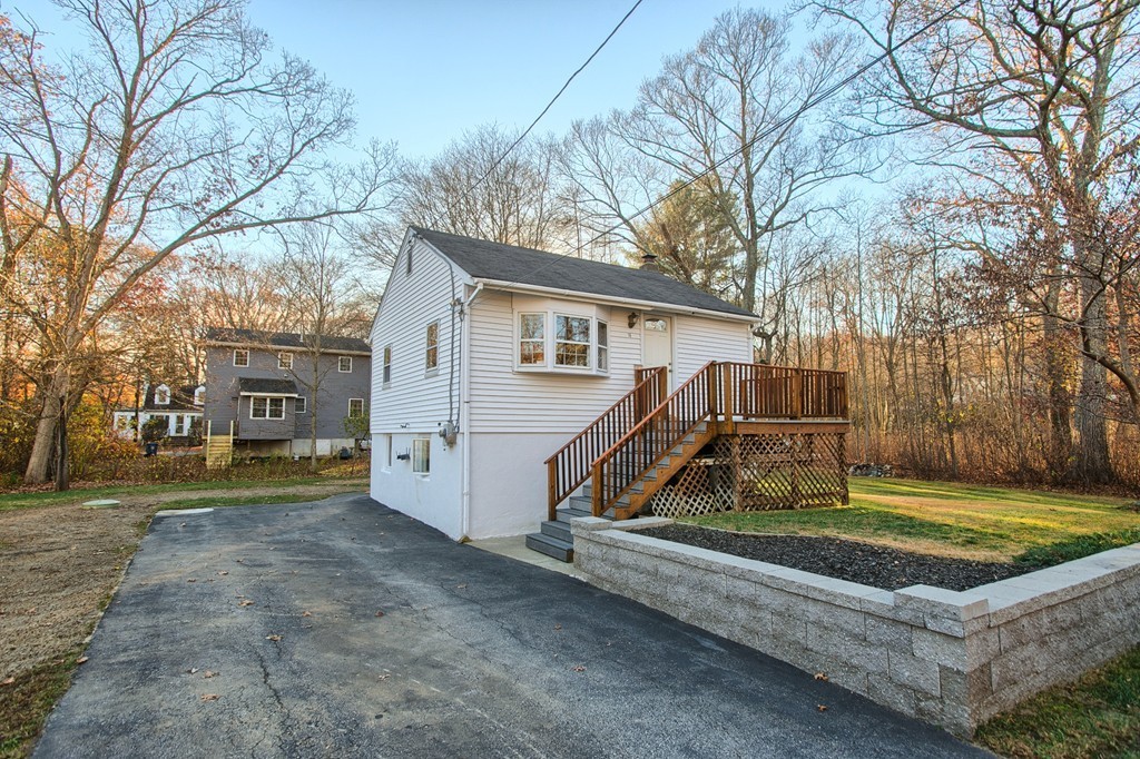 16 Loon Road Billerica, MA 01821 - Photo 14 of 24 a view of a house with a yard