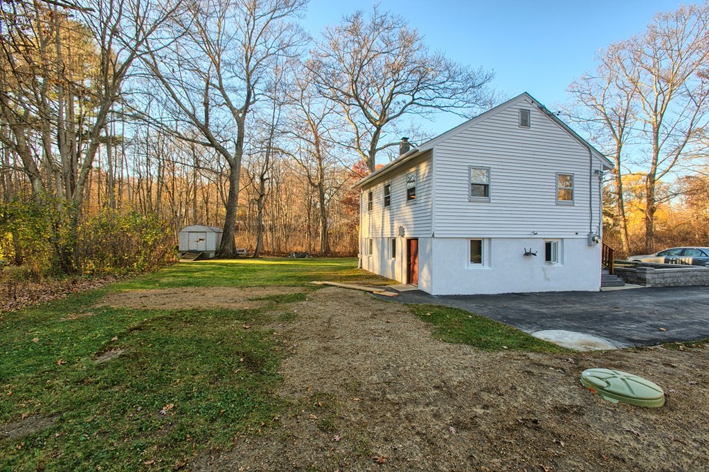 16 Loon Road Billerica, MA 01821 - Photo 16 of 24 a view of a house with a yard