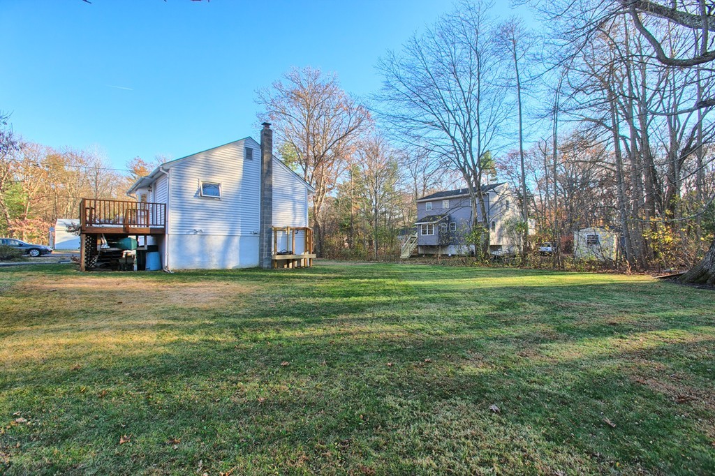 16 Loon Road Billerica, MA 01821 - Photo 19 of 24 a view of a street with houses