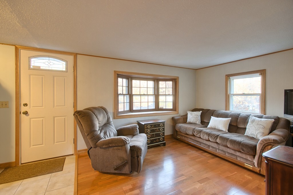 16 Loon Road Billerica, MA 01821 - Photo 2 of 24 a living room with furniture and a window