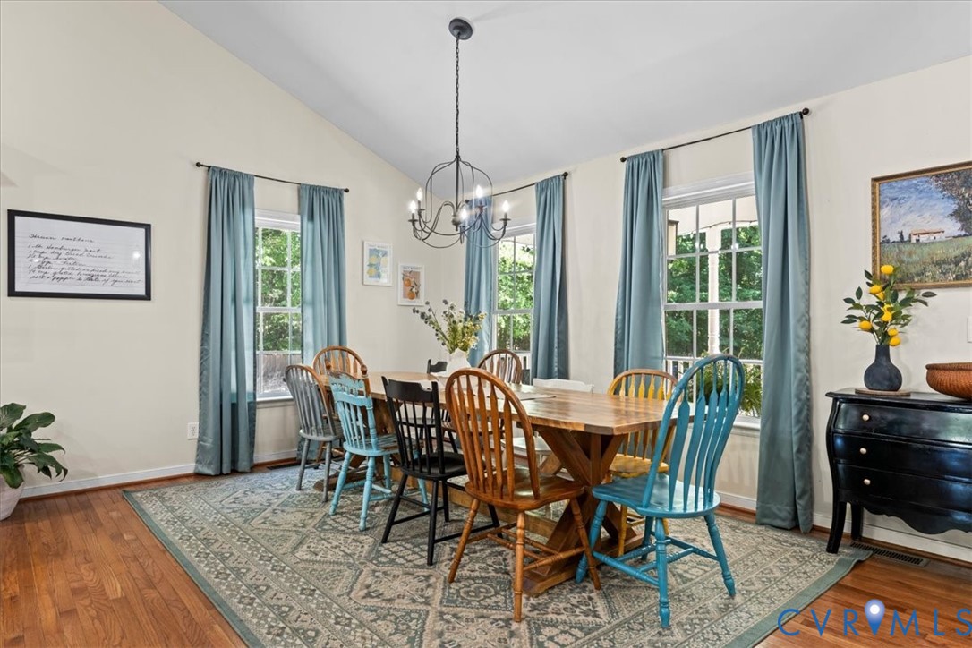 2043 Rocky Ford Road Powhatan, VA 23139 - Photo 11 of 78 a view of a dining room with furniture window and wooden floor