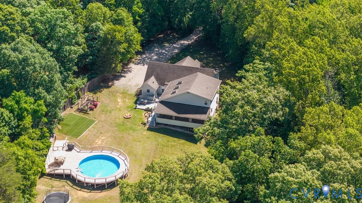 2043 Rocky Ford Road Powhatan, VA 23139 - Photo 73 of 78 an aerial view of a house with swimming pool and garden view