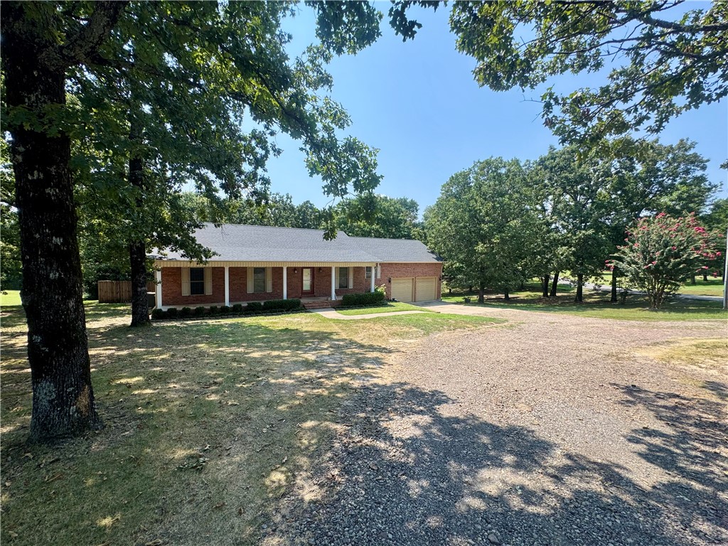 1197 Ridgeview Lane Russellville, AR 72802 - Photo 44 of 44 Traditional brick exterior with white columns and shutters