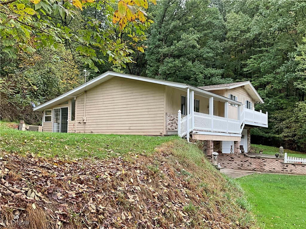 6568 Wylie Ridge Road New Cumberland, WV 26047 - Photo 27 of 28 View of front of home with a front lawn