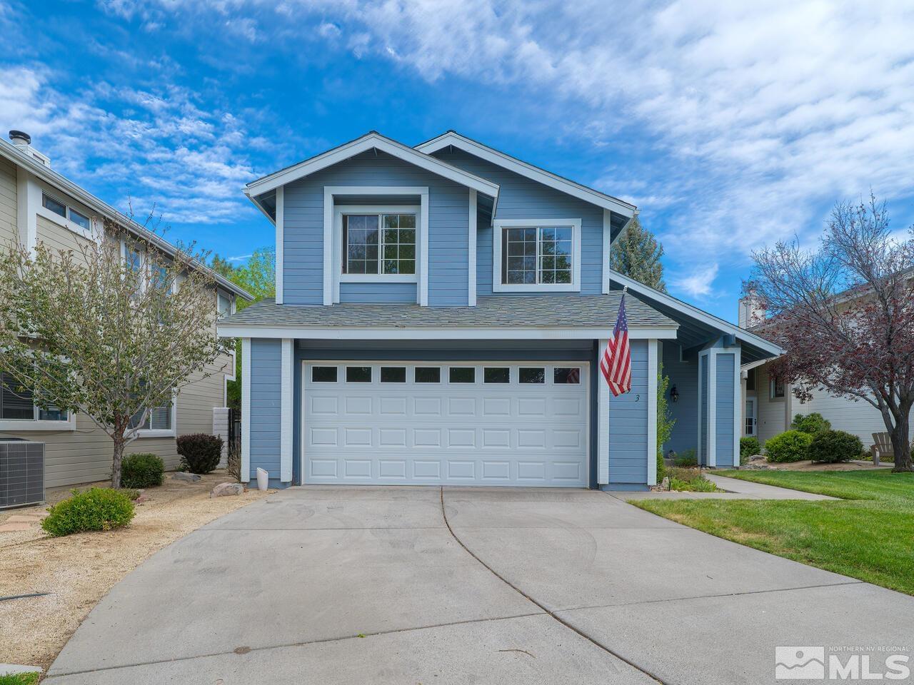 7593 Whimbleton Way Reno, NV 89511 - Photo 1 of 19 a front view of a house with a yard and garage