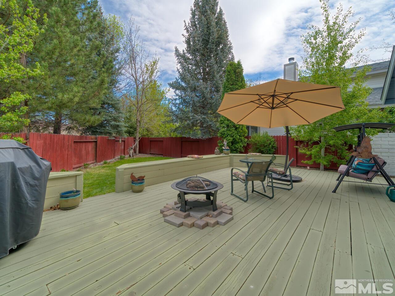 7593 Whimbleton Way Reno, NV 89511 - Photo 17 of 19 a view of a backyard with sitting area