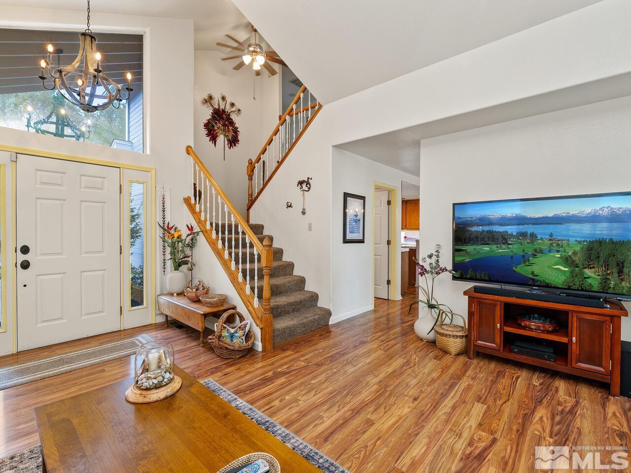 7593 Whimbleton Way Reno, NV 89511 - Photo 5 of 19 a living room with furniture and a flat screen tv