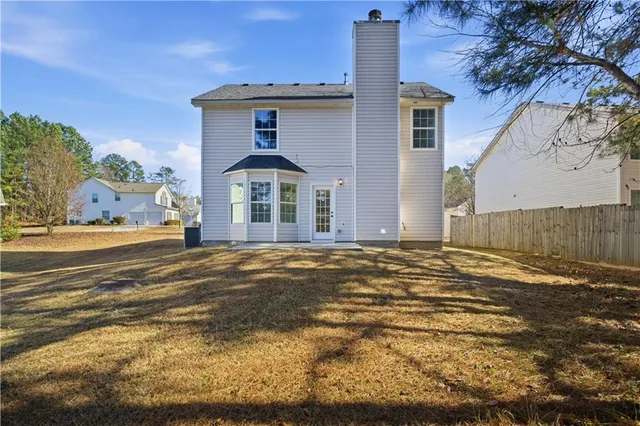 a front view of a house with a ocean view