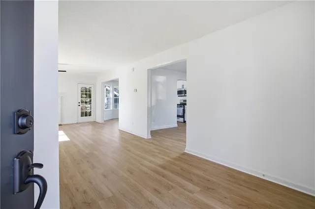a view of a livingroom and a sink