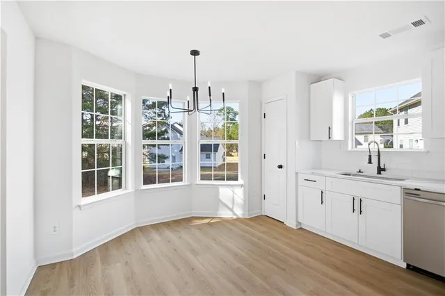 a view of a kitchen with a window