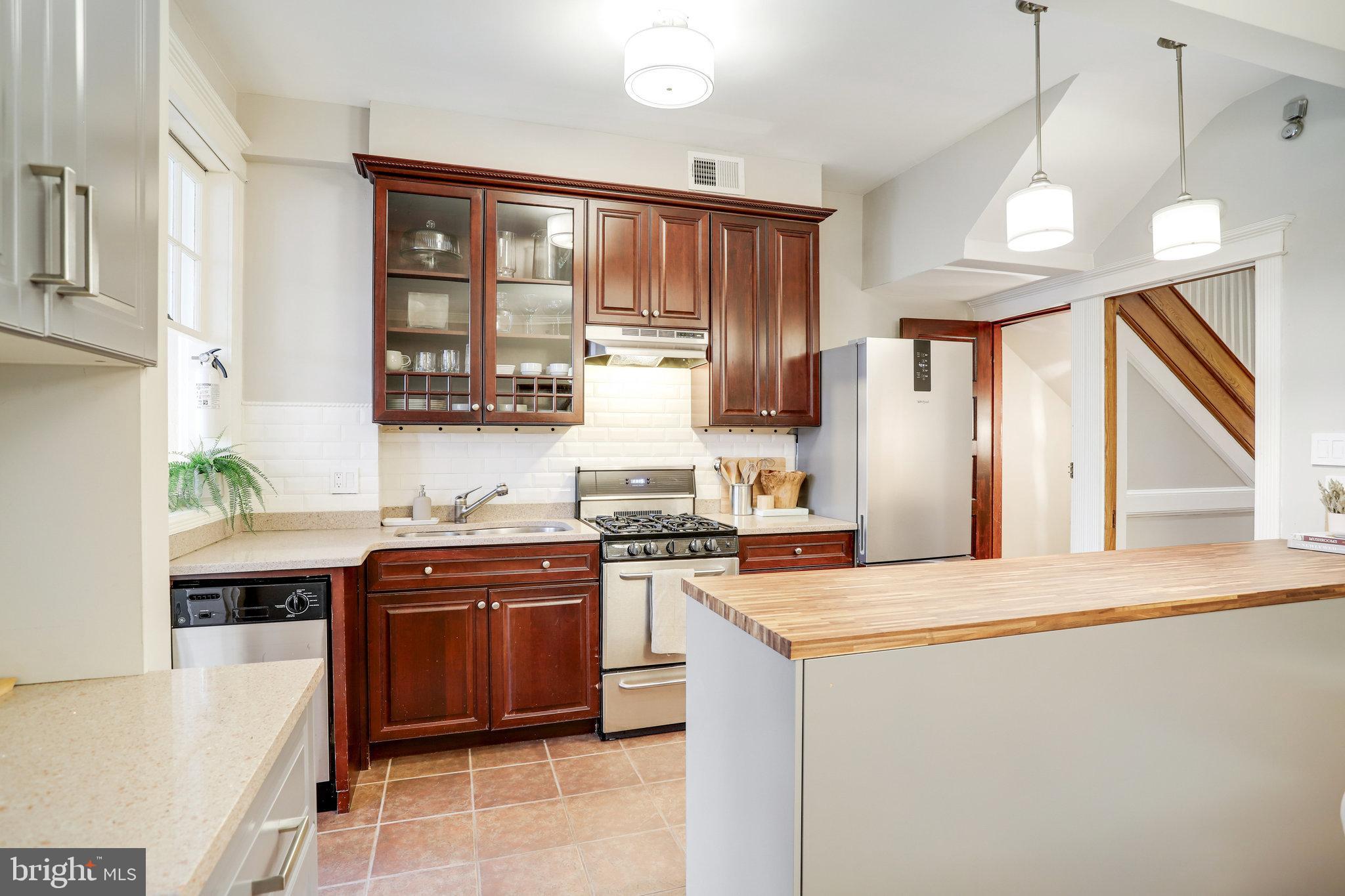 1507 A Street Northeast Washington, DC 20002 - Photo 11 of 57 Stainless appliances, quartz+butcher block counter