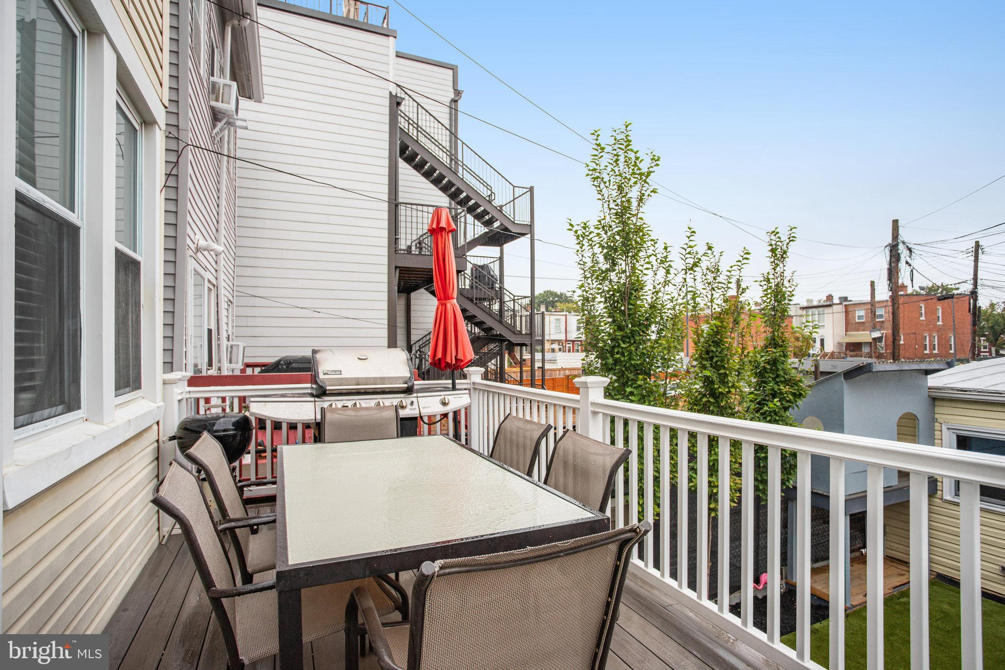 1507 A Street Northeast Washington, DC 20002 - Photo 15 of 57 Grill and dine al fresco on upper deck off sunroom