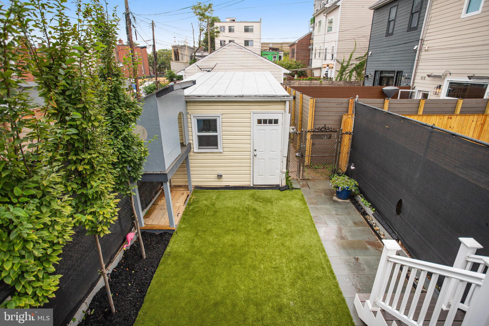 1507 A Street Northeast Washington, DC 20002 - Photo 16 of 57 Fun backyd and a storage garage w/alley access