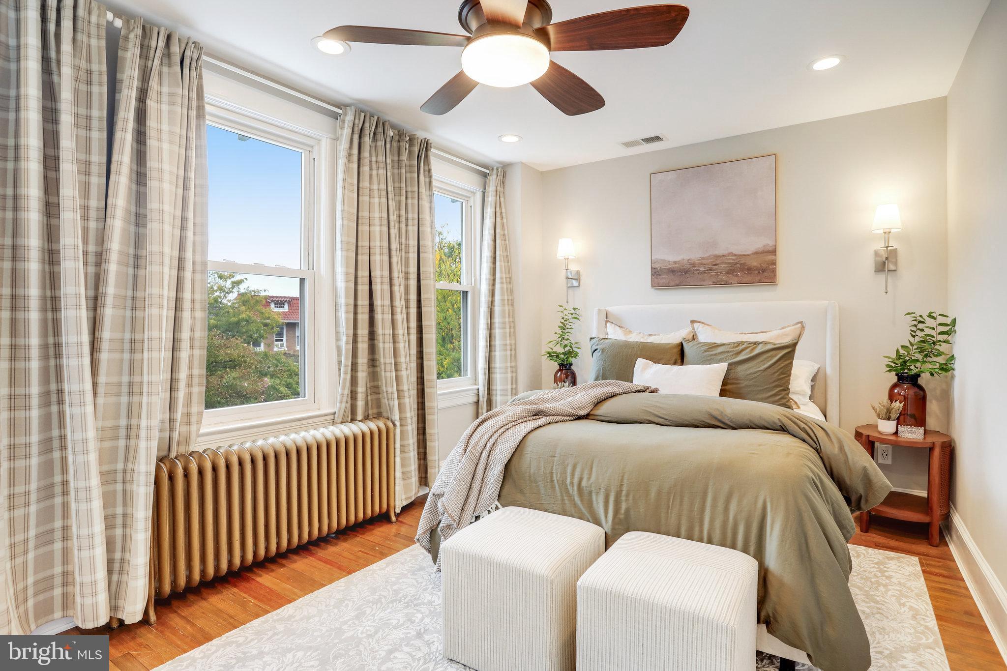 1507 A Street Northeast Washington, DC 20002 - Photo 18 of 57 Primary BR has 3 windows, gorgeous wood floors
