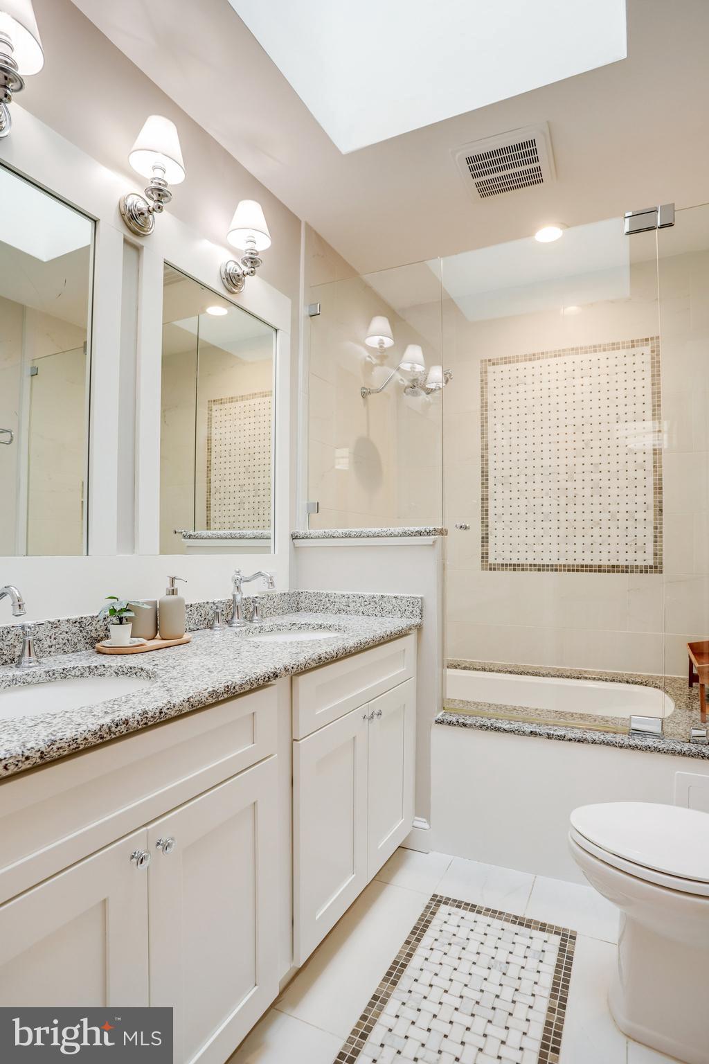1507 A Street Northeast Washington, DC 20002 - Photo 22 of 57 Double sink vanity, jetted tub, skylight, marble