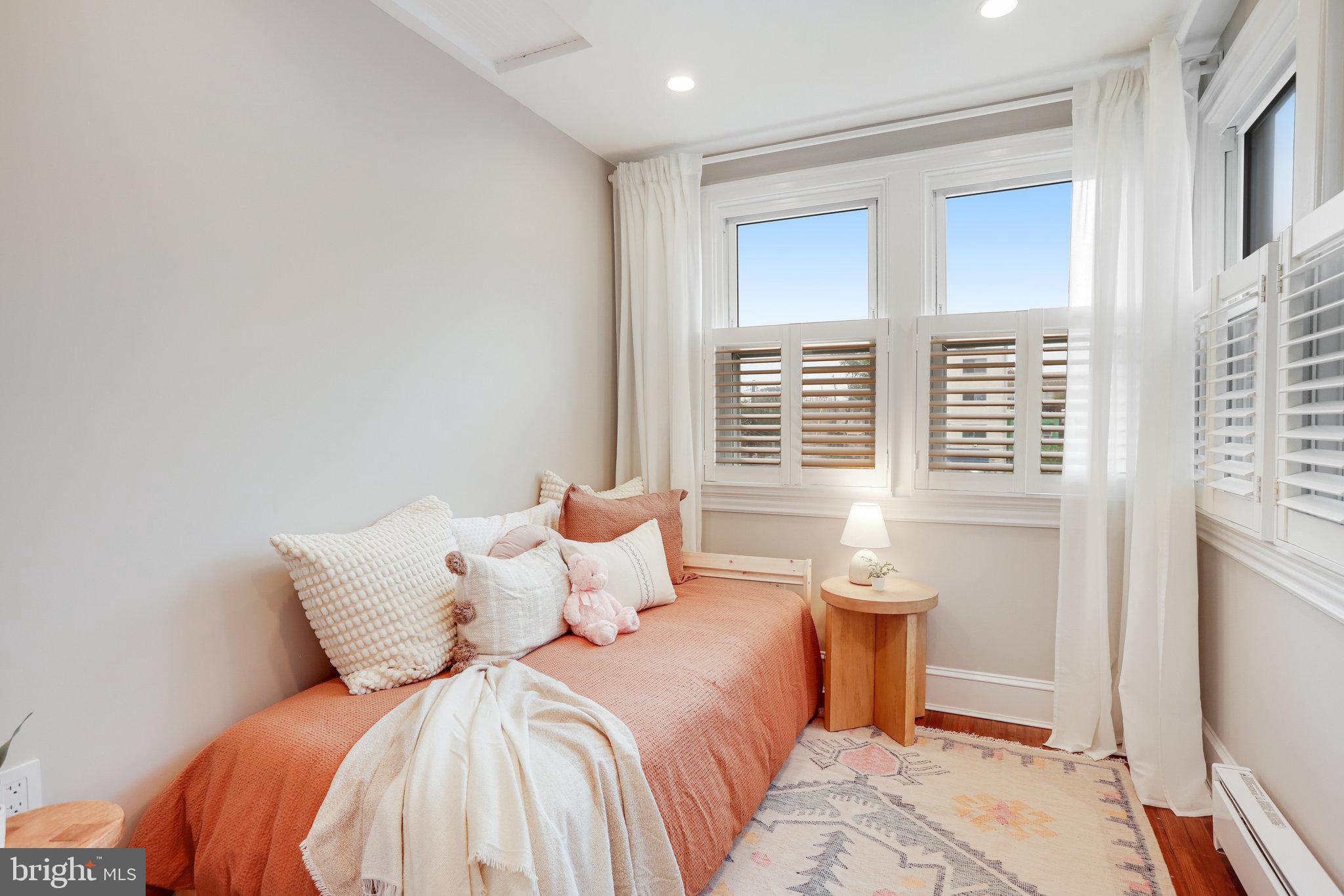 1507 A Street Northeast Washington, DC 20002 - Photo 29 of 57 Bright BR3 has gorgeous wood floor,s wood shutters