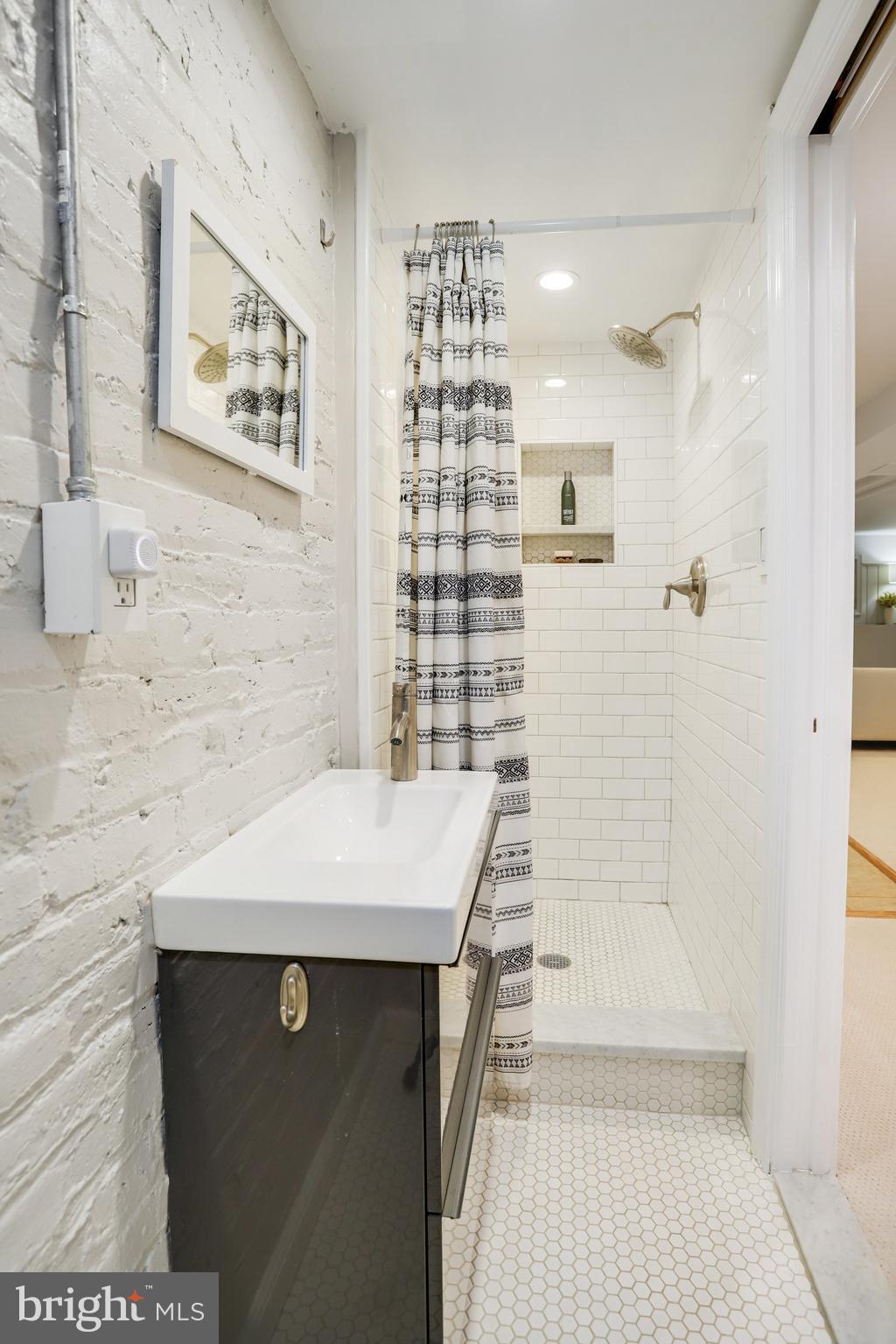 1507 A Street Northeast Washington, DC 20002 - Photo 39 of 57 3rd full BA has tiled shower, great for guests