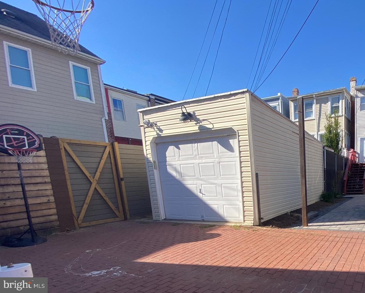 1507 A Street Northeast Washington, DC 20002 - Photo 45 of 57 Garage has alley access for bikes and motorcycles