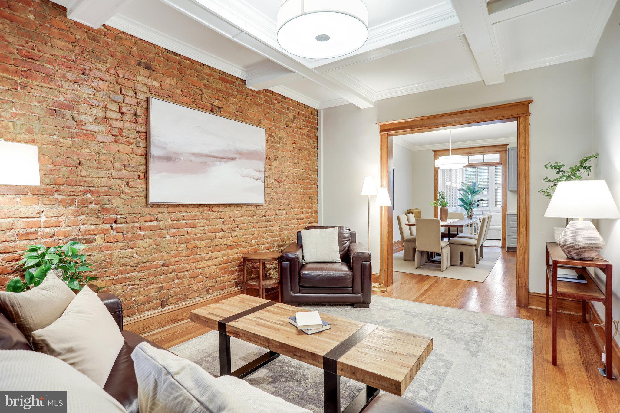 1507 A Street Northeast Washington, DC 20002 - Photo 6 of 57 Exposed brick, gorgeous wood floors
