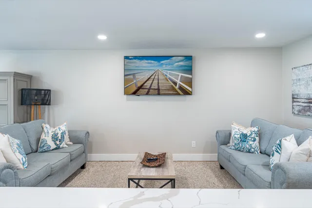 a living room with furniture and a couch