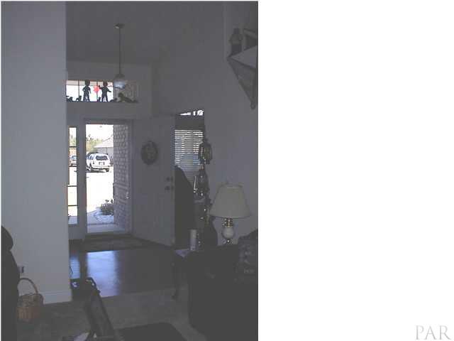 7477 Farmers Road Pensacola, FL 32526 - Photo 12 of 17 Storm Door at Front Entrance Lets the Sun Shine In!