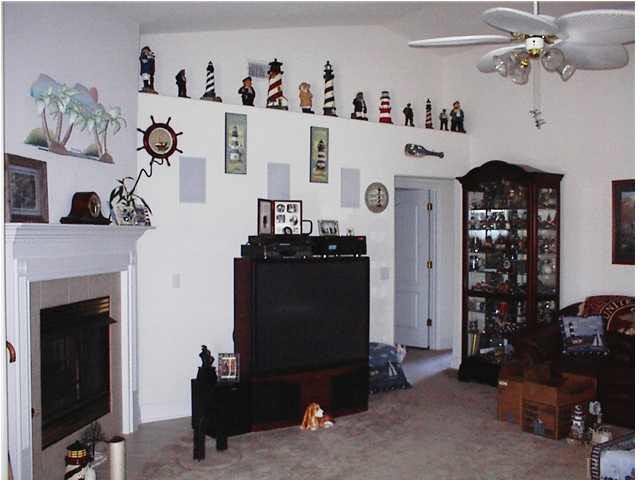 7477 Farmers Road Pensacola, FL 32526 - Photo 3 of 17 Great Family Room -- High Celings, Plant Ledges & Gas Fireplace!